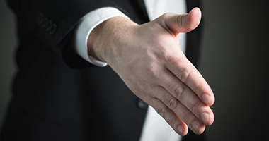 An open hand suggesting reconciliation.