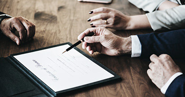 Close up of a divorce agreement being discussed.