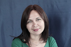 A portrait of Emma Cotswaulds, a senior partner of our firm.