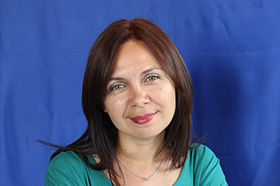 A portrait of Emma Cotswaulds, a senior partner of our firm.